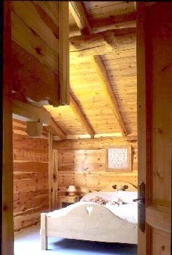 Location Bessans : Chambre avec un coin mezzanine