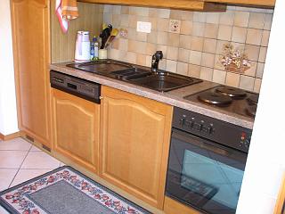Location Champéry : Cuisinière avec 4 plaques chauffantes